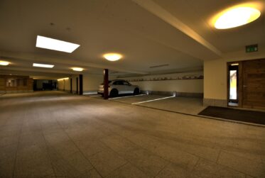 Place de parking dans un garage à la Route de Lens-Crans
